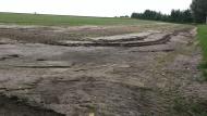 Geulvorming en sedimentatie op een grote akker veroorzaken water- en modderoverlast in Linter